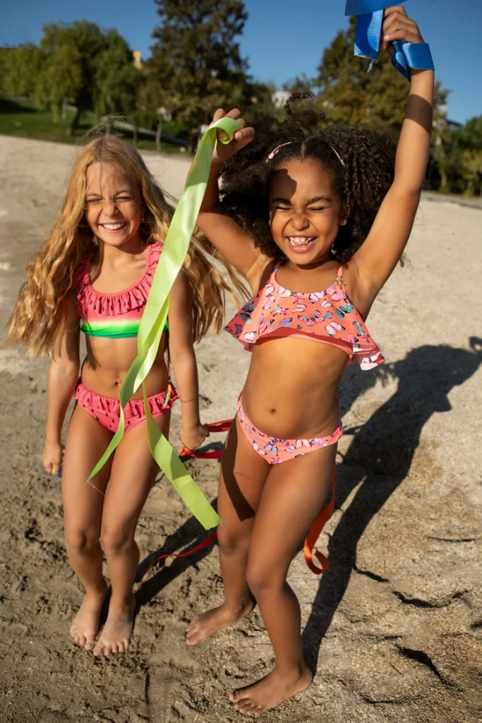 full shot girls playing beach 1 1